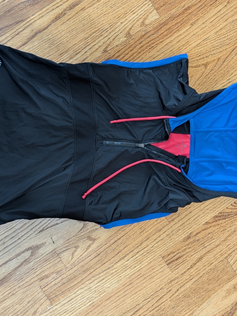 Athleta Women's Small Black Swim Sun Top with Blue Accents